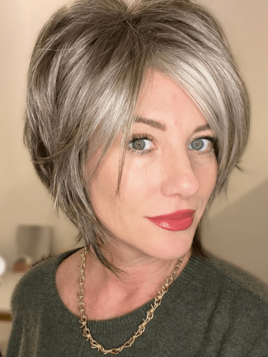 Jenny B. @thewiggygirl wearing REESE by NORIKO in color SANDY SILVER | Medium Brown Transitionally Blending to Silver and Dramatic Silver Bangs FB MAIN IMAGE
