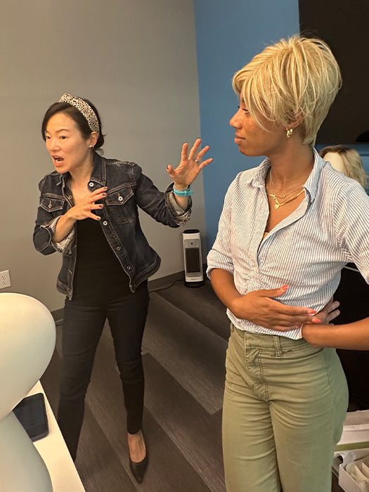 Wig Designer Grace showing off one of her Estetica wigs