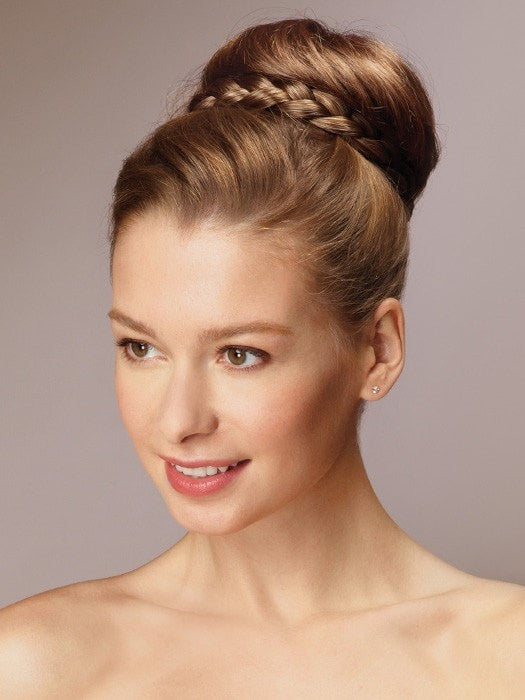 Style your hair in a low or high bun | Color: Frosted