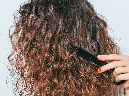 How do I keep my wig from tangling at the nape?