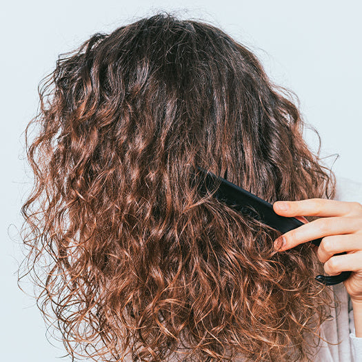 How do I keep my wig from tangling at the nape?
