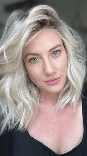 Jenny B. @thewiggygirl wearing BIG SPENDER by RAQUEL WELCH WIGS in color RL16/22SS SHADED ICED SWEET CREAM | Pale Blonde with Slight Platinum Highlighting with Dark Roots