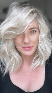 Jenny B. @thewiggygirl wearing BIG SPENDER by RAQUEL WELCH WIGS in color RL16/22SS SHADED ICED SWEET CREAM | Pale Blonde with Slight Platinum Highlighting with Dark Roots