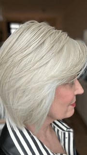 Mel B. @mels.be.ageless wearing REAL DEAL by RAQUEL WELCH WIGS in color RL16/22 ICED SWEET CREAM | Pale Blonde with Slight Platinum Highlighting