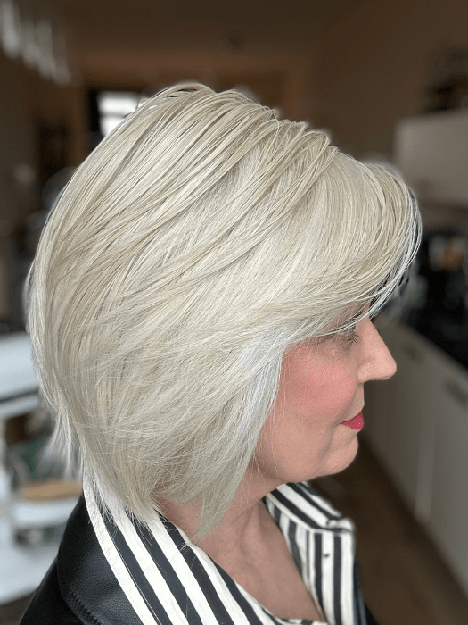 Mel B. @mels.be.ageless wearing REAL DEAL by RAQUEL WELCH WIGS in color RL16/22 ICED SWEET CREAM | Pale Blonde with Slight Platinum Highlighting