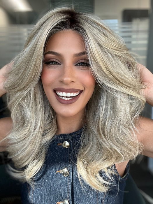 Roxie is wearing BEAUTY REIGN by GABOR in color GF19-23SS BISCUIT | Light Ash Blonde Evenly Blended with Cool Platinum Blonde with Dark Roots