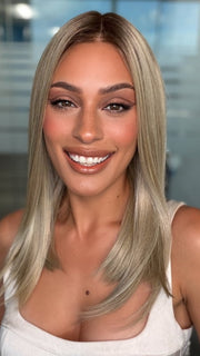 Roxie wearing SLONE by RENE OF PARIS in BUTTERCREAM BLONDE R | Light Ash Blonde, Medium Honey Blonde, and Pale Gold Hues blended
