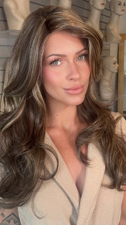 Madeline wearing LILLY by BELLETRESS in CHOCOLATE BUTTERCREAM R | Medium and Dark Brown Rooted with a Blend of Medium Brown and Dark Blonde