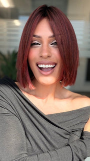 Roxie wearing CUTTING EDGE by GABOR in GF132SS SANGRIA | Intense Fiery Red with dark roots and blended highlights for dimension and depth