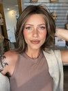 Madeline wearing FERRARI by BELLETRESS in CHOCOLATE BUTTERCREAM R | Medium and Dark Brown Rooted with a Blend of Medium Brown and Dark Blonde