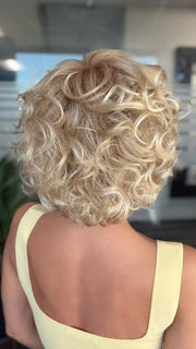 Roxie is wearing BOUYANT by GABOR in GL14-22SS SS SANDY BLONDE | Dark golden blonde base blends into multi-dimensional tones of medium gold blonde and light beige blonde