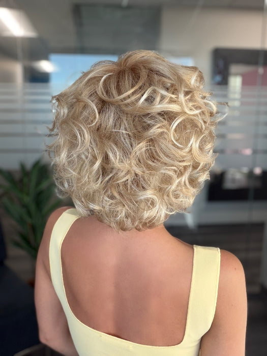 Roxie is wearing BOUYANT by GABOR in GL14-22SS SS SANDY BLONDE | Dark golden blonde base blends into multi-dimensional tones of medium gold blonde and light beige blonde