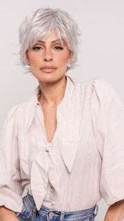 Roxie wearing VOLTAGE by RAQUEL WELCH in R56/60 SILVER MIST | Lightest Grey Evenly Blended with Pure White