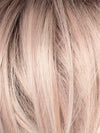 POLARIZING PINK | Icy platinum blonde blended with soft rose and silver undertones. Medium ash brown roots add dimension and depth. 
