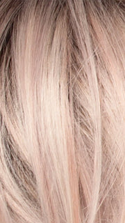 POLARIZING HEAT | Icy platinum blonde blended with soft rose and silver undertones. Medium ash brown roots add dimension and depth. 
