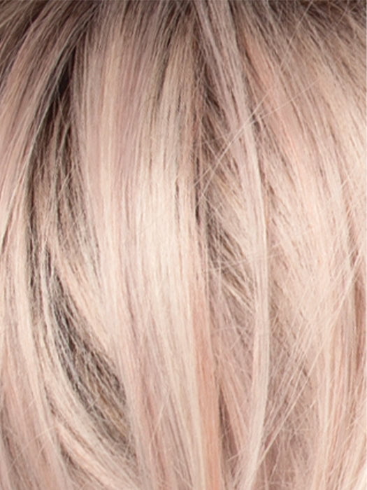 POLARIZING HEAT | Icy platinum blonde blended with soft rose and silver undertones. Medium ash brown roots add dimension and depth. 

