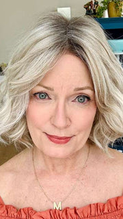 Mel B. @mels.be.ageless wearing JANUARY PETITE by JON RENAU in color FS17/101S18 PALM SPRINGS BLONDE | Light Ash Blonde with Pure White Natural Violet Bold Highlights, Shaded with Dark Natural Ash Blonde
