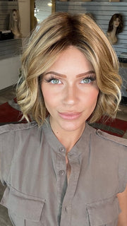Madeline wearing AUSTEN by BELLETRESS in  CARAMEL TOFFEE BLONDE-R | Toffee is a warm, dimensional shade blending medium brown with golden blonde and caramel highlights. Softly rooted for a natural, sun-kissed finish.