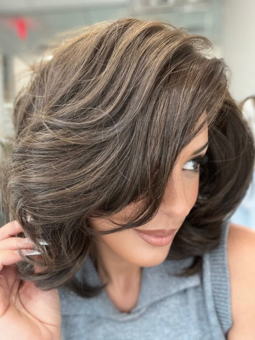 Roxie is wearing FLIP THE SCRIPT by RAQUEL WELCH in color RL4/6 BLACK COFFEE 