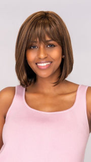 Model is wearing PAIGE PETITE by ENVY in color MEDIUM BROWN | Medium Brown with natural highlights