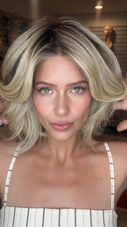 Madeline wearing ELIZABETH by JON RENAU in 22F16S8 VENICE BLONDE | Light Ash Blonde and Light Natural Blonde Blend Shaded with Medium Brown