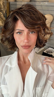 Madeline wearing HOUSTON by TRESSALLURE in FRENCH ROAST BROWN-R  | A deep, luxurious brunette featuring a dark brown base with warm bronze and subtle red undertones. Softly rooted for natural depth and dimension.