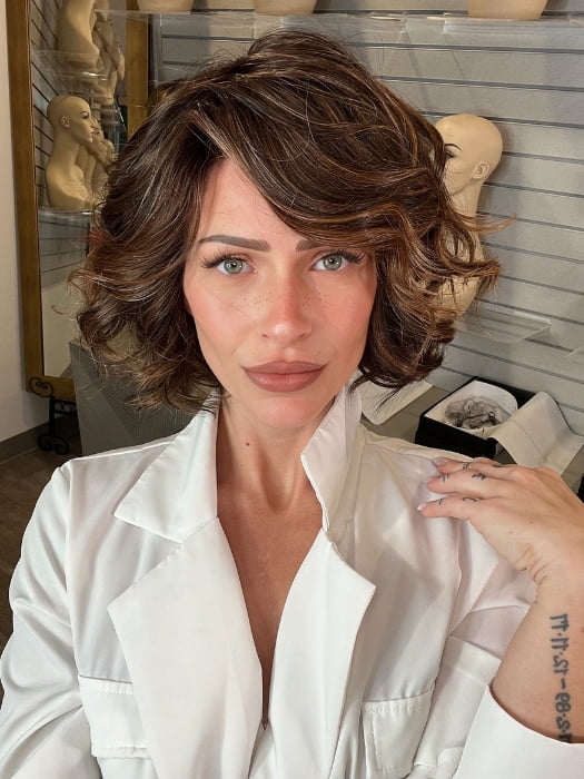 Madeline wearing HOUSTON by TRESSALLURE in FRENCH ROAST BROWN-R  | A deep, luxurious brunette featuring a dark brown base with warm bronze and subtle red undertones. Softly rooted for natural depth and dimension.