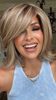Crystal @crystallhoneycutt is wearing UPSTAGE LARGE by RAQUEL WELCH in RL12/22SS SHADED CAPPUCCINO | Light Golden Brown Evenly Blended with Cool Platinum Blonde Highlights with Dark Roots