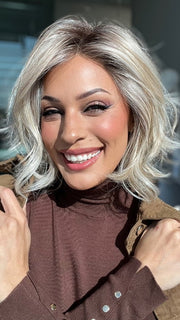 Roxie wearing NEWPORT by BELLETRESS in MILKSHAKE BLONDE R | A mixture of Light Sandy Brown, Highlighted with Light Ash Blonde with a Hint of Light Platinum Blonde with a Medium Root Color