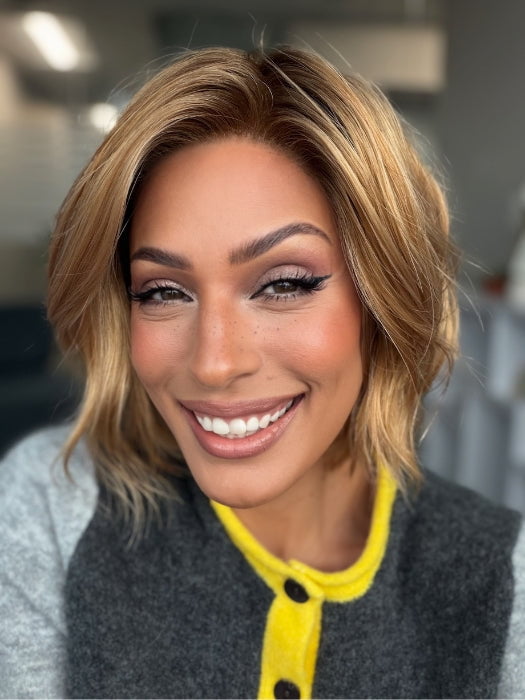 Roxie wearing ESPRIT by Ellen Wille in TOFFEE BLONDE ROOTED 27.20 | Dark Strawberry Blonde with Light Strawberry Blonde Blend and Shaded Roots