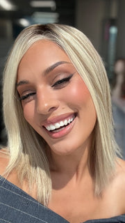 Roxie wearing CARRIE PETITE by JON RENAU in 101/88/27S8 CATALINA BLONDE | Pale blonde with Pure White Natural Violet halo highlights, shaded medium brown 