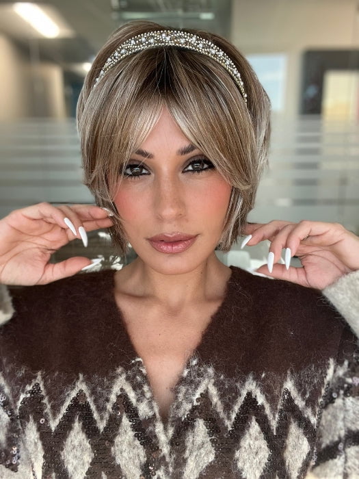 ROXIE wearing ZEAL by NORIKO in MELTED-MARSHMALLOW | Subtly Warm Dark Sandy Blonde Blend with Medium Brown Roots and Light Ash Blonde Tips and Highlights
