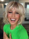 Roxie wearing FLAWLESS WAVES by TRESSALLURE in 19/23/R12 | A beautiful blend of Platinum Blonde and Pale Golden Blonde, shaded with Dark roots