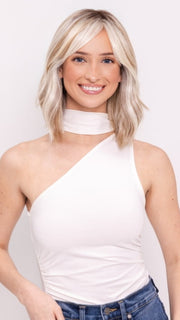 Ava wearing HOLLIE by JON RENAU in 101/88/27S8 CATALINA BLONDE | Pale blonde with Pure White Natural Violet halo highlights, shaded medium brown 