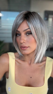 Roxie is wearing JUBILANT by GABOR in GL44-66SS SUGARED NICKEL | Deep charcoal base blends into multi-dimensional tones of medium grey with steely white highlights