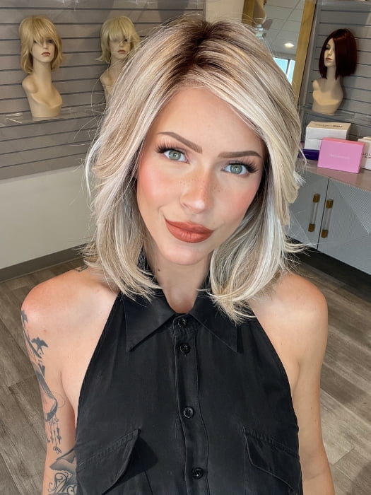 Madeline wearing PARK AVE by BELLETRESS in MILKSHAKE BLONDE R | A mixture of Light Sandy Brown, Highlighted with Light Ash Blonde with a Hint of Light Platinum Blonde with a Medium Root Color