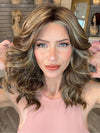 Madeline wearing ELLE by BELLETRESS in CAPPUCINO LATTE R | A Deep brunette with light brown highlights and lowlights