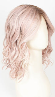 POLARIZING PINK | Icy platinum blonde blended with soft rose and silver undertones. Medium ash brown roots add dimension and depth. 