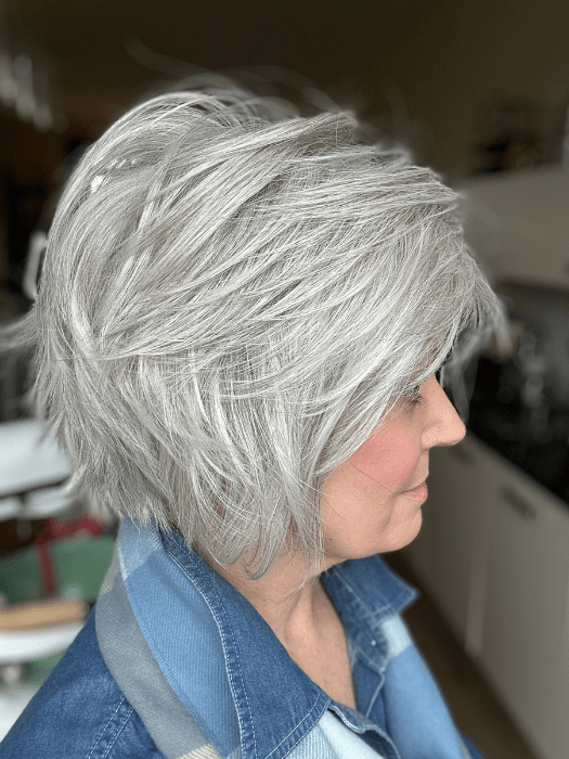 Mel B. @mels.be.ageless wearing FLIRTING WITH FASHION by RAQUEL WELCH WIGS in color GF56-60 SILVER | Lightest Gray Evenly Blended with Pure White