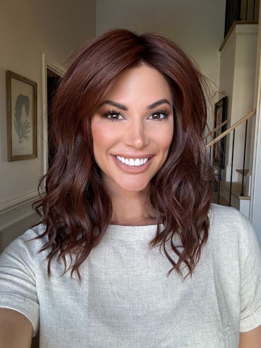 Katy C. @thewigeducator wearing BEACH WAVE MAGIC by TRESSALLURE in color 10/130R | Bright Red with Medium Brown roots