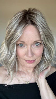 Mel B. @mels.be.ageless wearing SIMMER ELITE by RAQUEL WELCH WIGS in color RL17/23SS ICED LATTE MACCHIATO | Honey Blonde shaded with Cool Blonde with Dark Roots. 