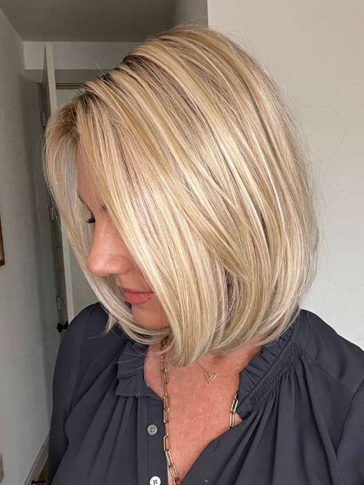 Jenny B. wearing HAUTE by JON RENAU in color FS17/101S18 PALM SPRINGS BLONDE | Light Ash Blonde with Pure White Natural Violet Bold Highlights, Shaded with Dark Natural Ash Blonde