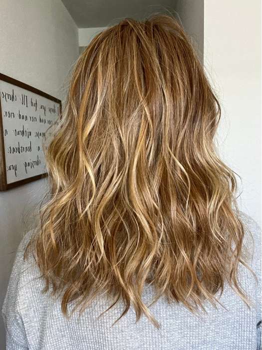 Jenny B. @thewiggygirl wearing BEACH WAVE MAGIC by TRESSALLURE in color 14/26/R10 | Red Blonde with Gold Blonde highlights and Light Brown roots