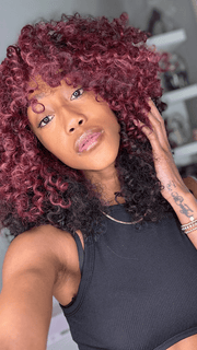 Seairra @seairrairving_ wearing MAKAYALA by KIM KIMBLE in color MC4/35SS SANGRIA | Dark Rooted Red with Fiery Red Highlights