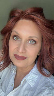 Emily Herrin @she_sheds_more wearing UNFILTERED by RAQUEL WELCH WIGS in color RL33/35 DEEPEST RUBY | Dark Auburn Evenly Blended with Ruby Red