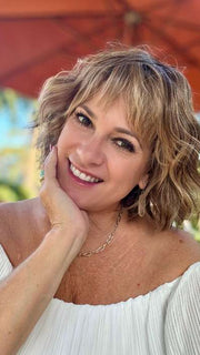Susan Cooke wearing TREND by TRESSALLURE in color 17/23/R8 | Beige Blonde and Auburn Blended with Medium Brown Roots