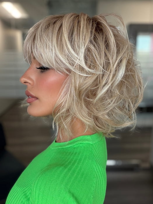 Roxie wearing FLAWLESS WAVES by TRESSALLURE in 19/23/R12 | A beautiful blend of Platinum Blonde and Pale Golden Blonde, shaded with Dark roots