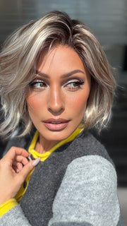 Roxie wearing ESPRIT by Ellen Wille in PEARL BLONDE ROOTED 101.20.25 | Pearl Platinum Blended with Light Strawberry Blonde and Lightest Golden Blonde with Shaded Roots