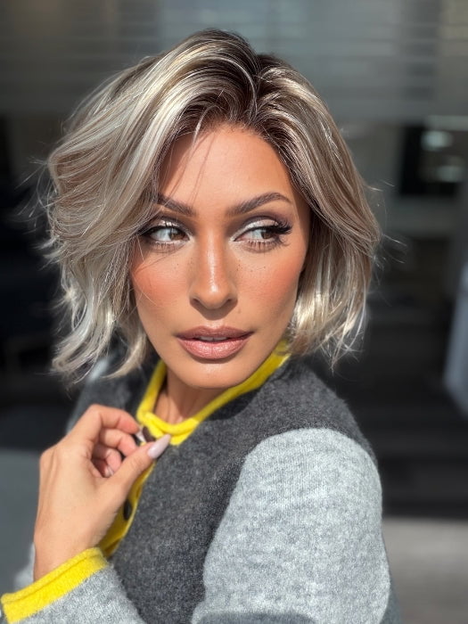 Roxie wearing ESPRIT by Ellen Wille in PEARL BLONDE ROOTED 101.20.25 | Pearl Platinum Blended with Light Strawberry Blonde and Lightest Golden Blonde with Shaded Roots