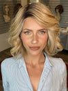Madeline wearing UNFILTERED by RAQUEL WELCH in RL14/22SS SHADED WHEAT | Dark Blonde Evenly Blended with Platinum Blonde with Dark Roots